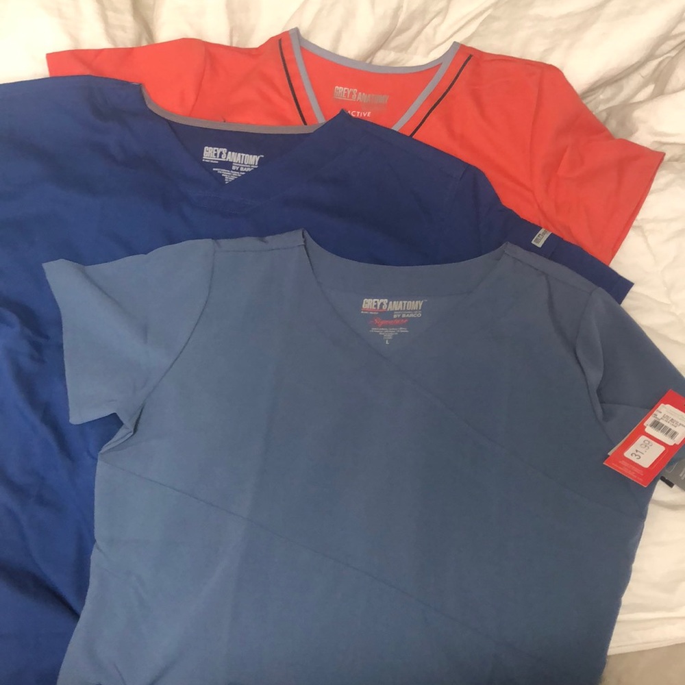 New scrub tops, three for $35